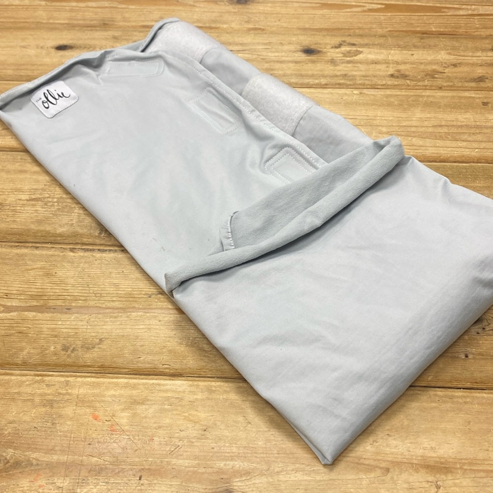 Ollie Baby Swaddle,  2 area with small brown spots, overall is good condition.